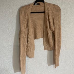 Tan cropped cardigan.